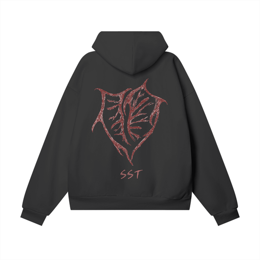 Premium black heavyweight hoodie showcasing a red heart inspired by bats, print for bold streetwear style.